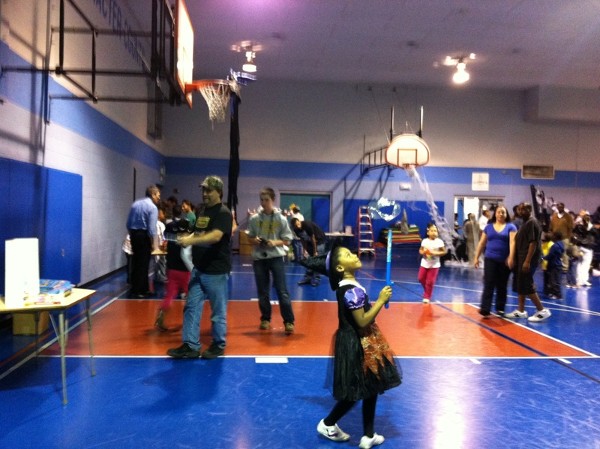 Children participate in experiments during the chapter's event in October.